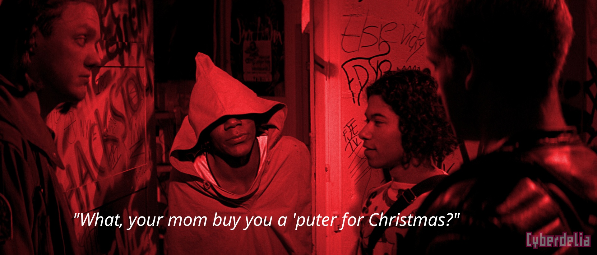 Hackers quote on red image of characters standing at Lord Nikon's door: "What, your mom buy you a 'puter for Christmas?"