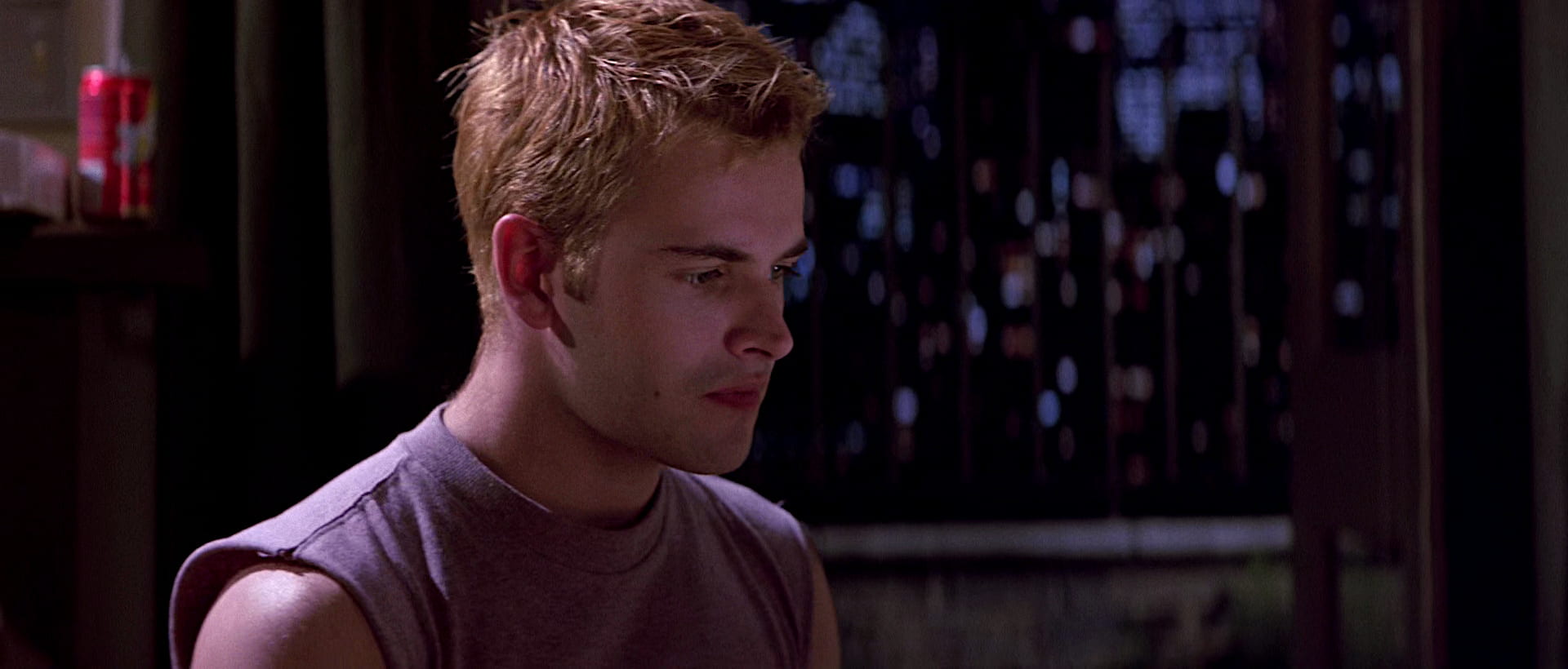 Hackers (1995) scene. Dade Murphy staring sheepishly down at computer after revealing he has a record for past hacking crime, he was Zero Cool.